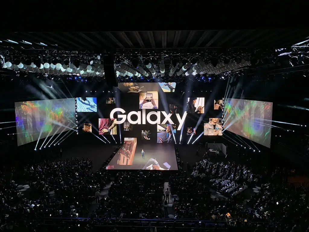 A group stands on the stage.